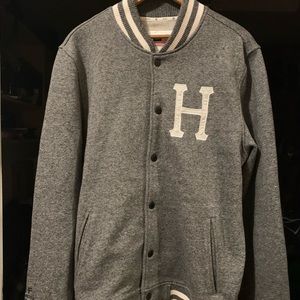 HUF letterman’s light jacket.